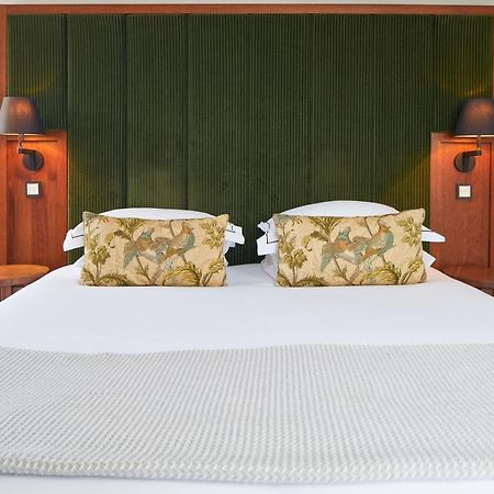 Aparthotel Cheval The Edinburgh Grand Esterno foto A bed with a mattress