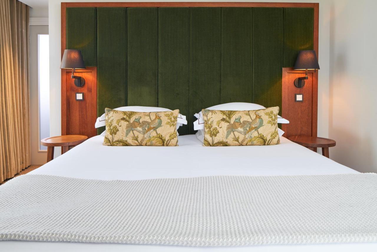 Aparthotel Cheval The Edinburgh Grand Esterno foto A bed with a mattress