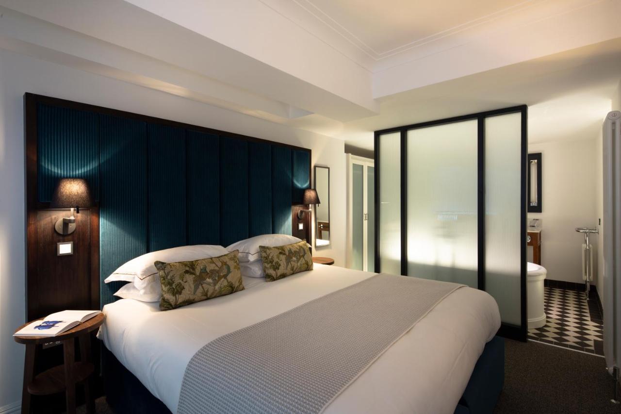 Aparthotel Cheval The Edinburgh Grand Esterno foto A bedroom at the hotel